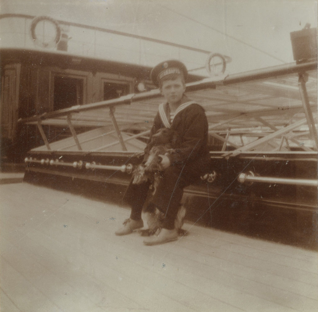Tsesarevich Alexei on the imperial yacht The Standart with is dog 