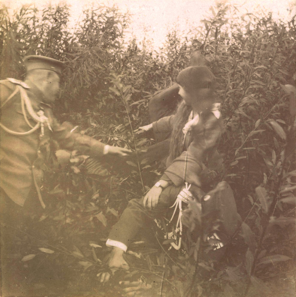 Grand Duchess Anastasia Romanov playing a game of "the bushes" with officers on the Dnepr in 1916. Photo credit: ГА РФ, ф. 640 оп. 3 д. 25 л. 82 об. фото 1242