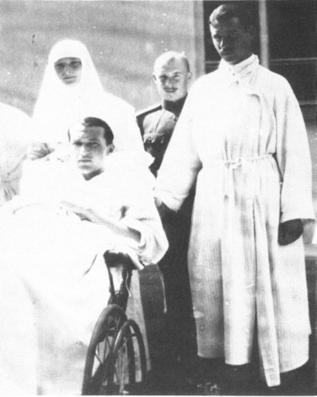 Grand Duchess Tatiana worked as a nurse at the royal infirmary. The patient in the wheelchair is her favorite officer, Dmitri Malama. 