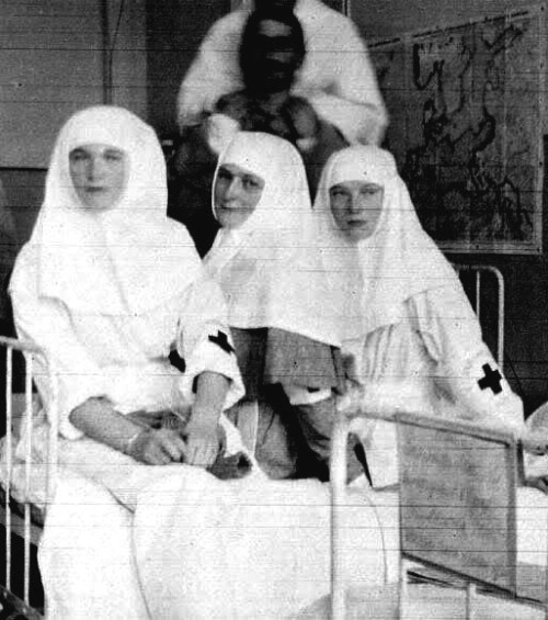 Tsarina Alexandra and Grand Duchesses Olga and Tatiana in their Sisters of Mercy uniforms during the First World War