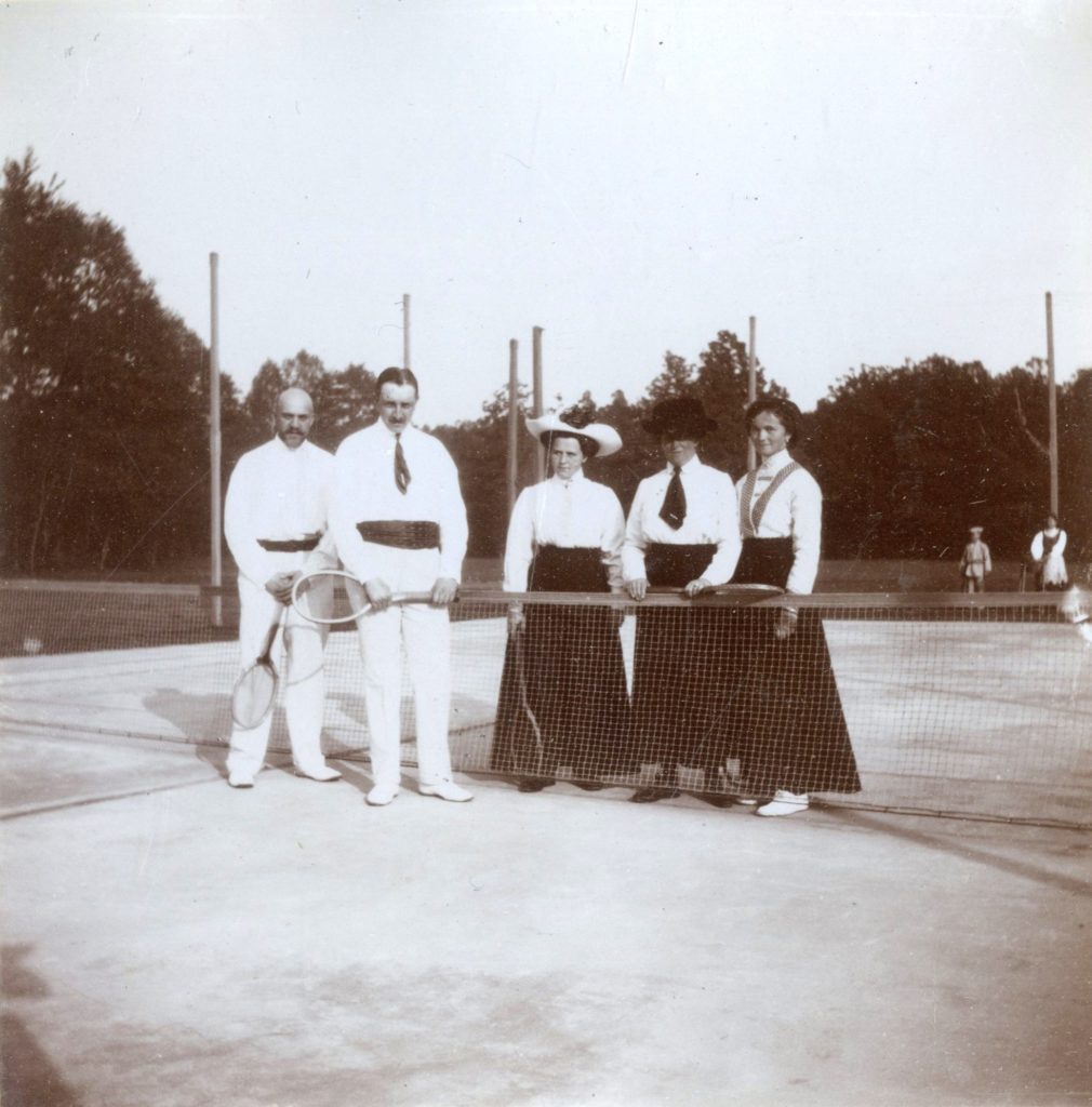 Olga Romanov, Anna Vyrubova and others on a tennis court. 