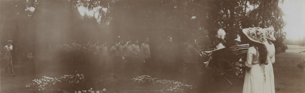 Click to enlarge this panoramic photo. The Romanov family in Peterhof on 5 August, 1913.