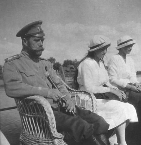 Nicholas II with his daughters Grand Duchesses Anastasia and Grand Duchess Maria on a boat ride down the Dnepr in 1916.