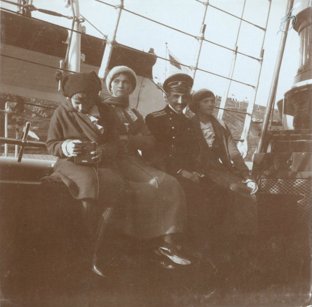 Grand Duchess Anastasia, Grand Duchess Olga, Pavel Voronov ("S") and Grand Duchess Tatiana 