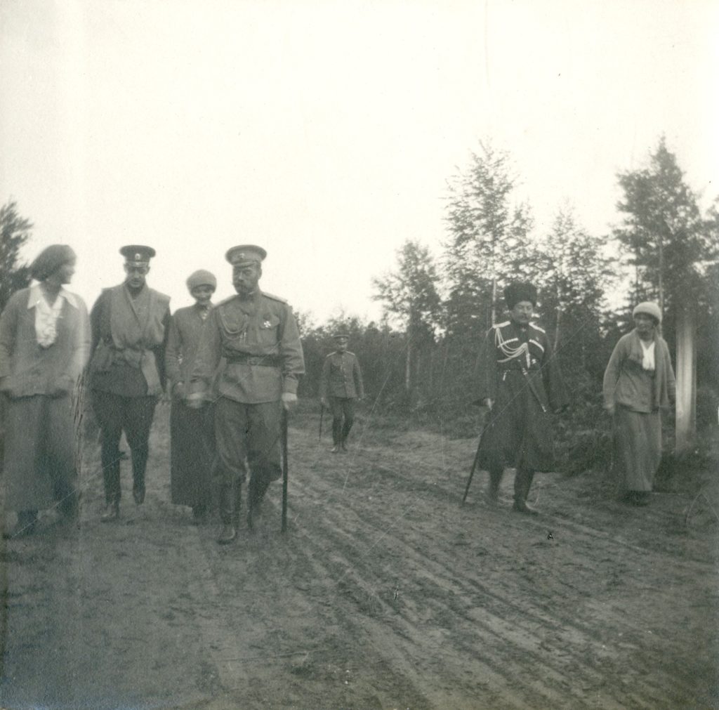 Left to right: Grand Duchess Maria, Grand Duke Dmitri Pavlovich, Tsar Nicholas II, Grand Duchess Tatiana and Grand Duchess Olga taking a walk in Mogilev in 1916. Photo credit: ГА РФ, ф. 683 оп. 1 д. 125 л. 20 фото 353