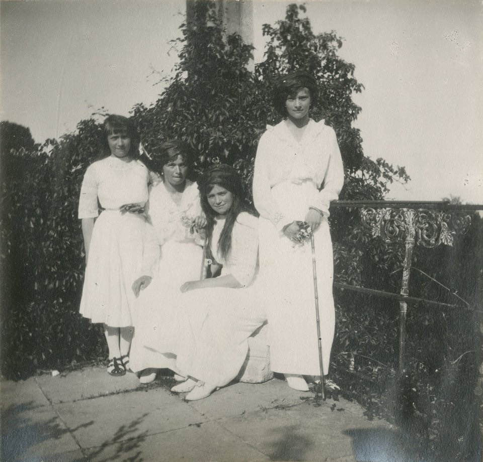 Grand Duchess Tatiana posing with her sisters, Grand Duchesses Olga, Maria and Anastasia at the "ruins of Oreanda". 