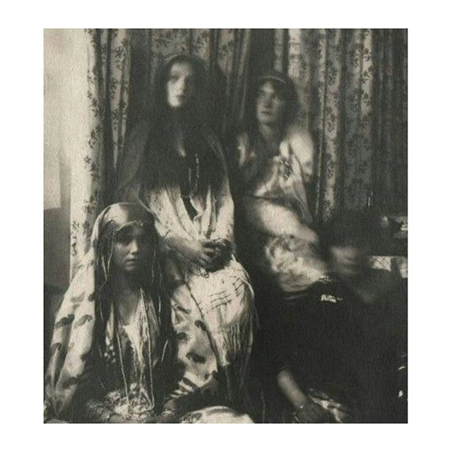 Grand Duchess Olga, Greand Duchess Tatiana and Grand Duchess Maria Romanov dressed in costumes, possibly for a play they put on for the family before the Russian revolution broke out. 
