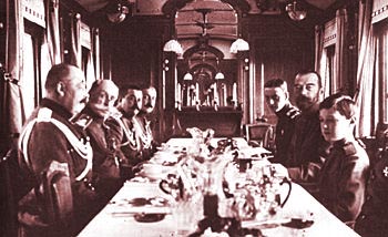 Nicholas II with Tsarevich Alexei and suite dining inside the Romanov family train