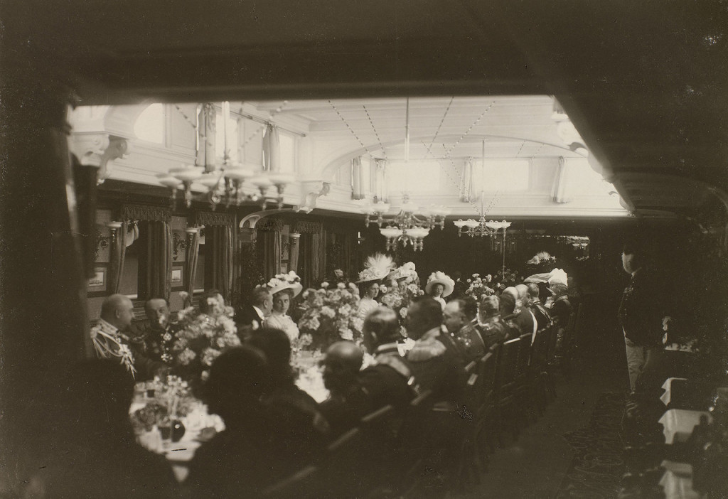 The Romanov family dining with their British royal cousins on The Standart 