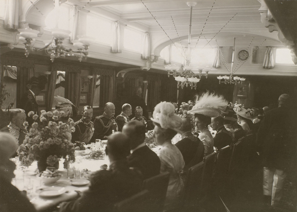 The Romanov family dining with their British royal cousins on The Standart 