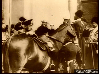 Tsar Nicholas II mounting a horse. 
