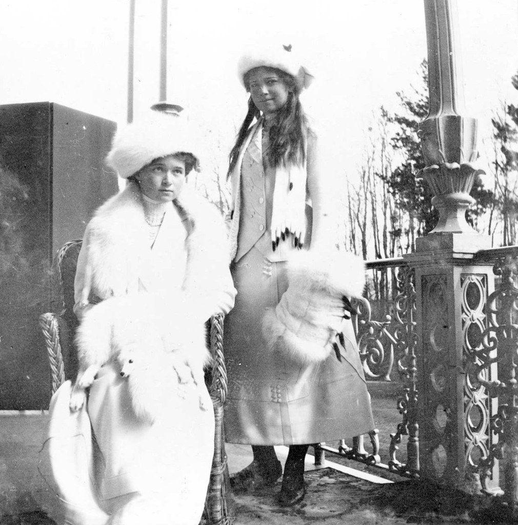 Grand Duchess Olga and Grand Duchess Maria posing on the Alexander Palace balcony