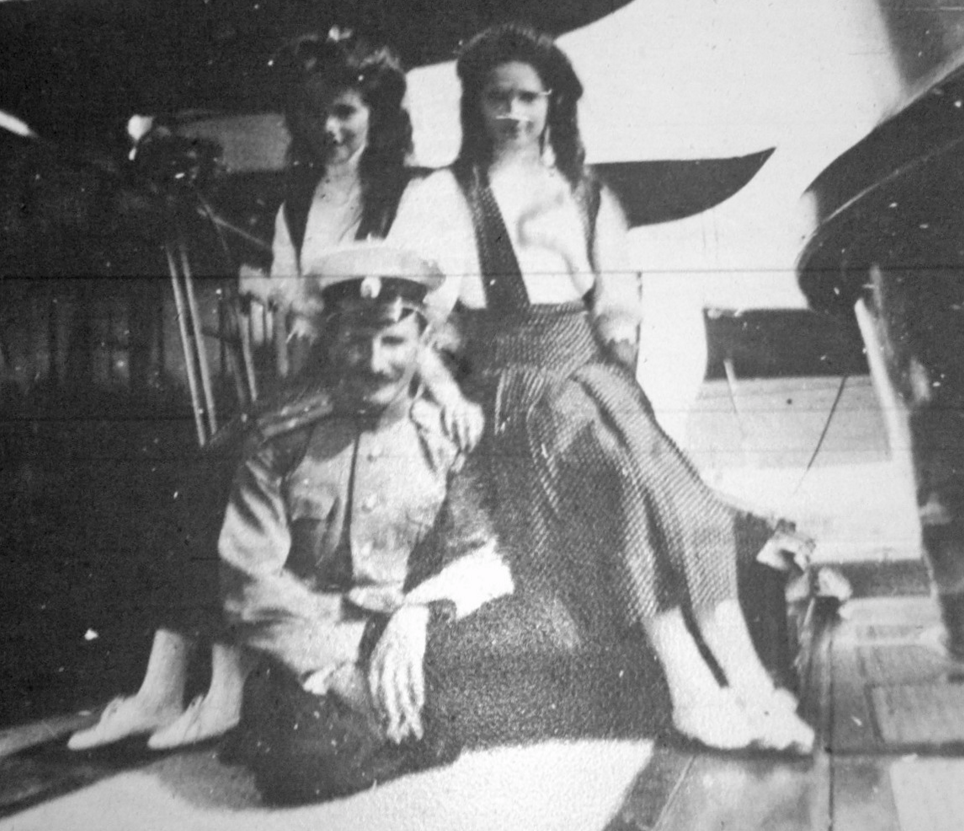 Grand Duchess Tatiana and Grand Duchess Maria with Officer Pavel Voronov, who later became the romantic interest of Grand Duchess Olga. This photo was taken on the Standart in 1911. 