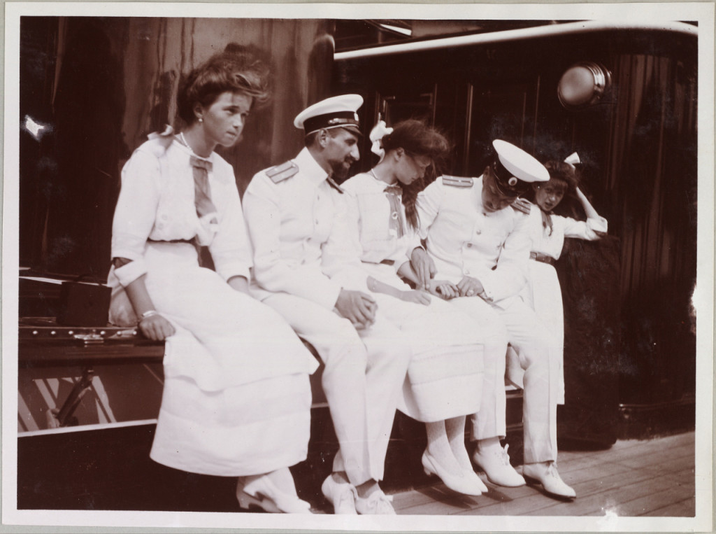 Grand Duchess Olga with Pavel Voronov, with Grand Duchess Tatiana and others on the deck of The Standart. 