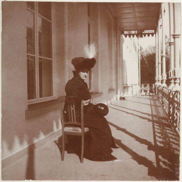 Empress Alexandra posing on the Alexander Palace balcony