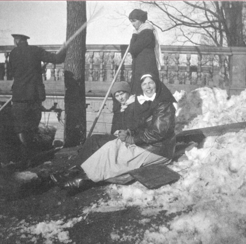  Grand Duchess Olga Alexandrovna in her nurse uniform playing in the snow with her eldest nieces, Grand Duchess Olga and Grand Duchess Tatiana. 