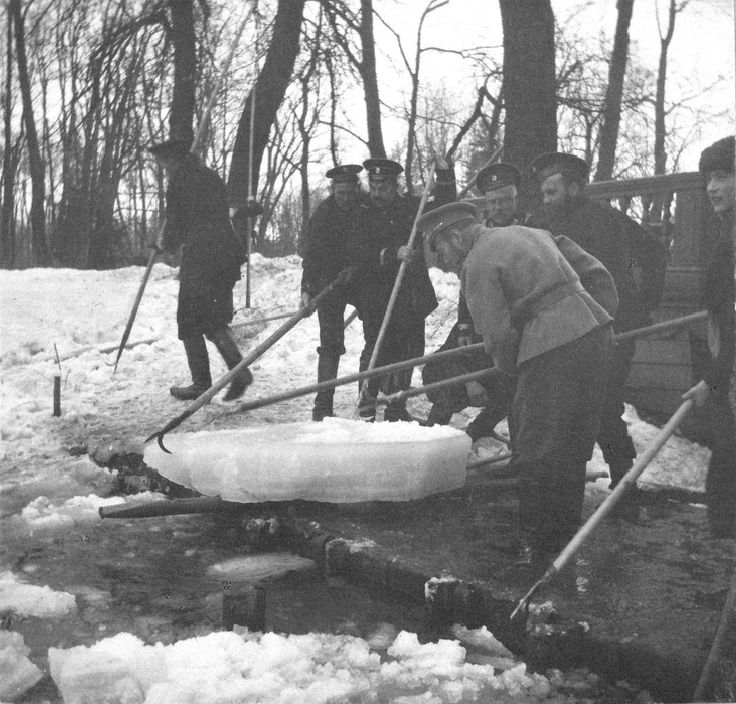 Romanov family loved snow. Tsar Nicholas II working on breaking the ice at Tsarskoe Selo in Spring of 1917. Grand Duchess Anastasia is on far right. 