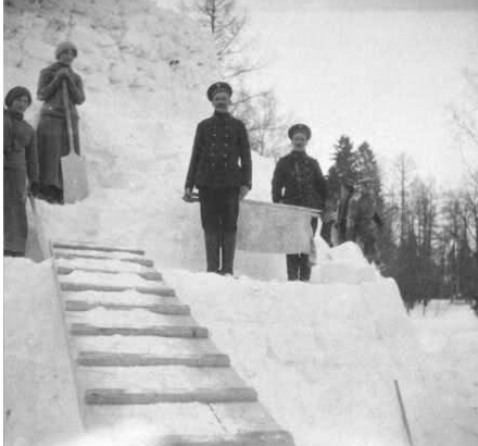 Grand Duchess Olga Romanov and Grand Duchess Tatiana Romanov at the snow tower. 