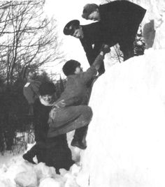 Tsarevich Alexei with his sister at the snow tower. 