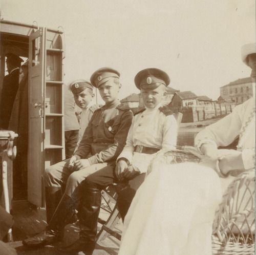 Alexei Romanov with the Derevenko brothers.